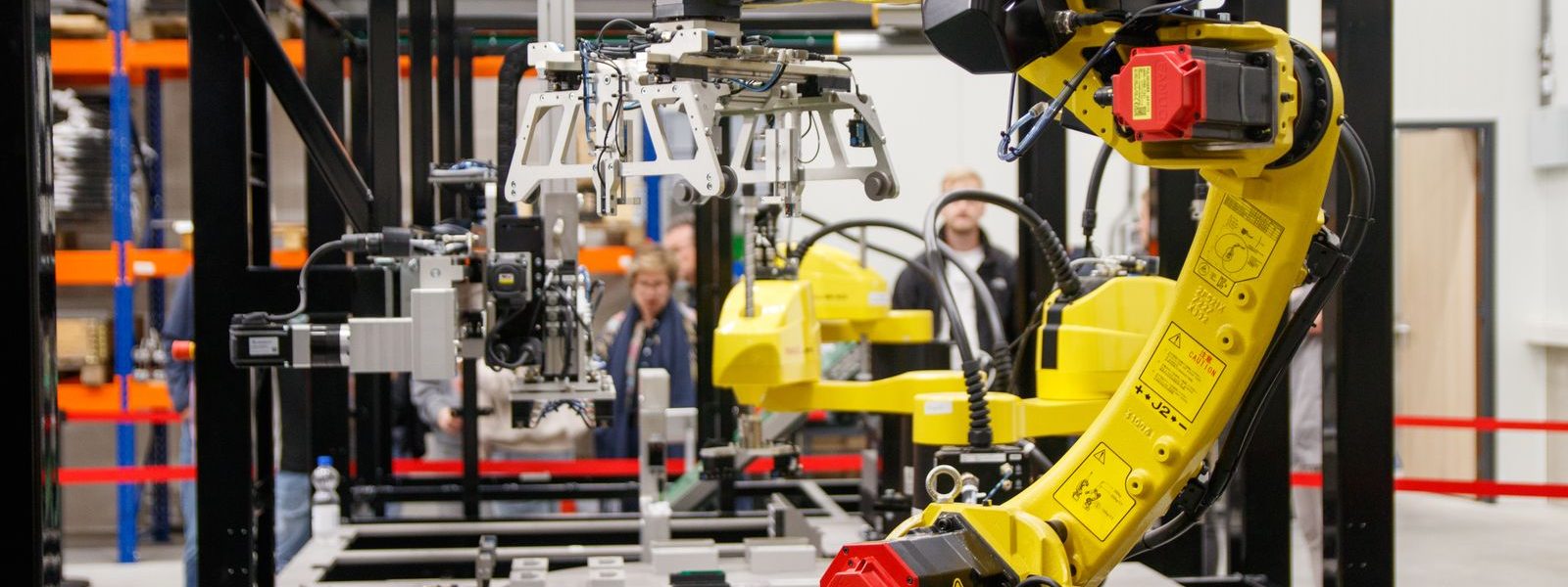 An industrial robot arm on a factory line running local edge AI